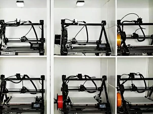 3D belt printers from iFactory3D lined up in a shelf, model One