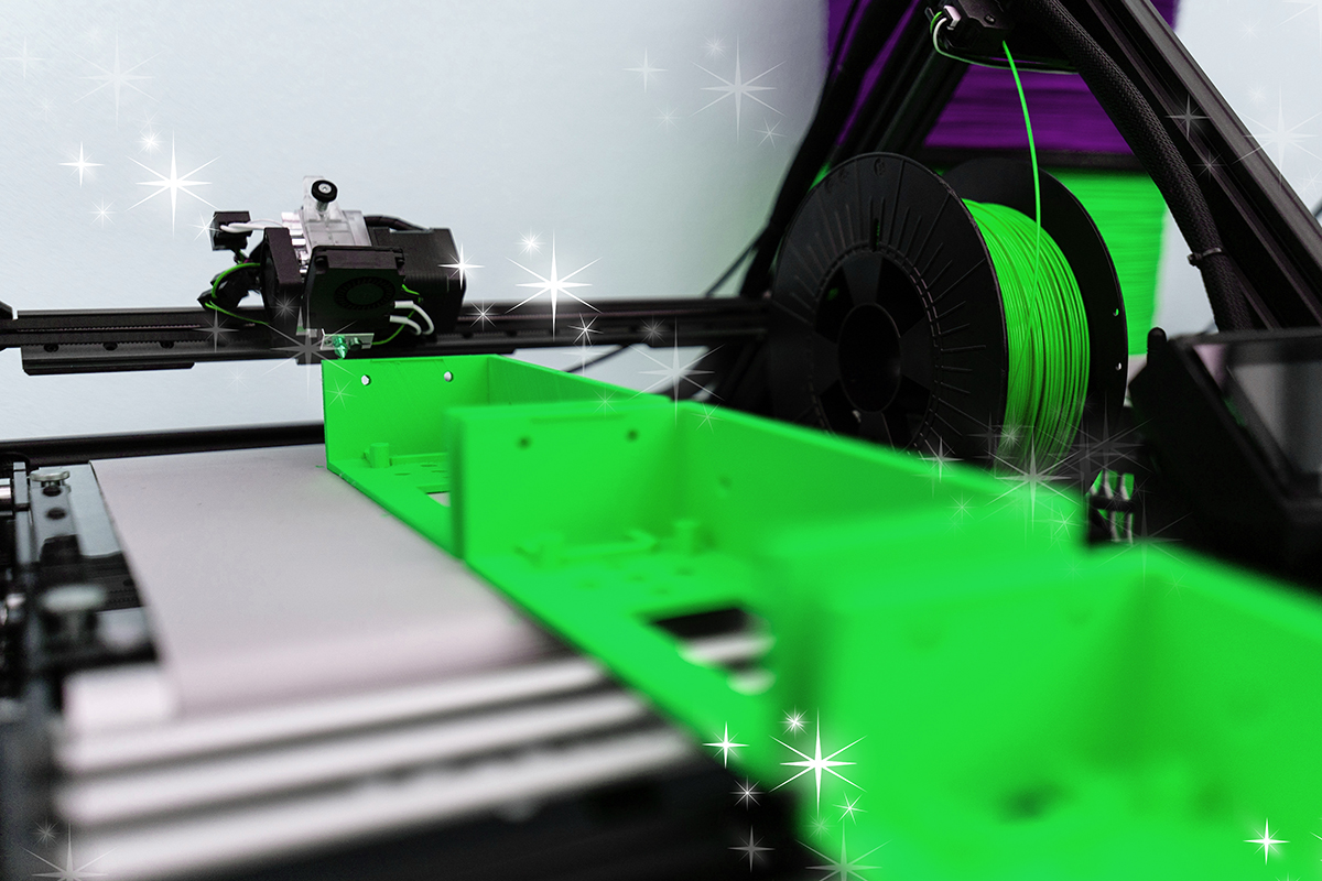 Image of 3D conveyor belt printer with bright colors and "magic" sparks